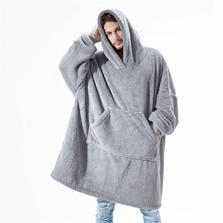 Oversized teppegenser med hette i grå