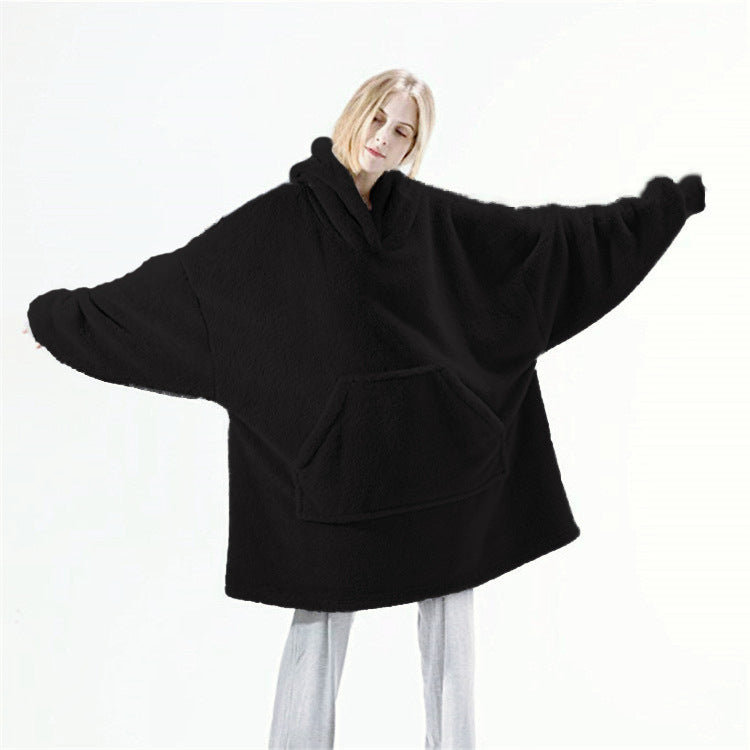 Oversized teppegenser med hette i grå