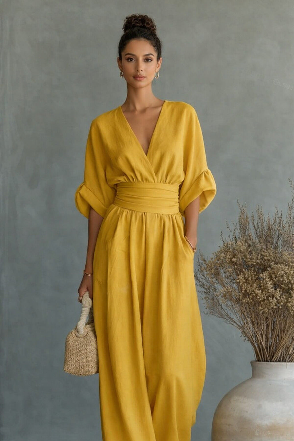Dame Vid Jumpsuit med Elegant Drapering og V-hals
