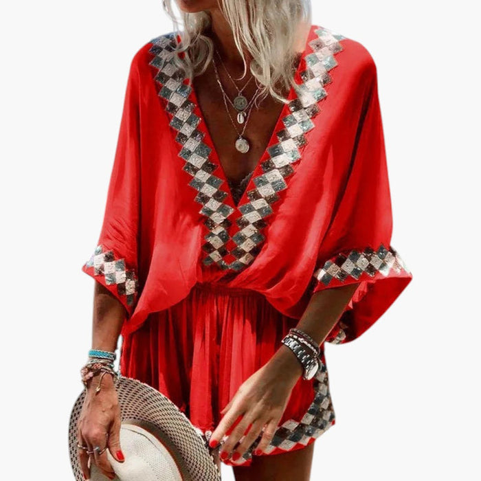 Dame Jumpsuit med V-hals og Vide Ben