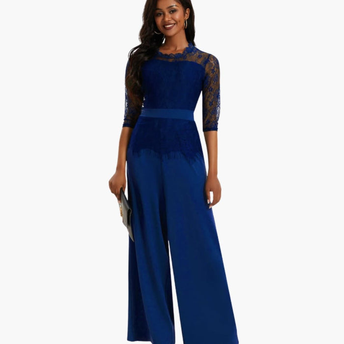 Kvinnens vide bukse jumpsuit med blondermerker og definert midje