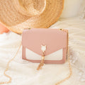 Liten crossbody-veske med kattelås i rosa