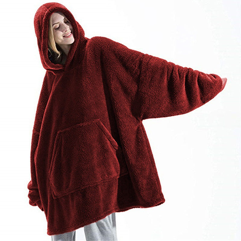 Oversized teppegenser med hette i grå