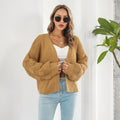 Grovstrikket cardigan med puffermer